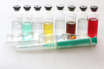 background medicine pill vials syringes
