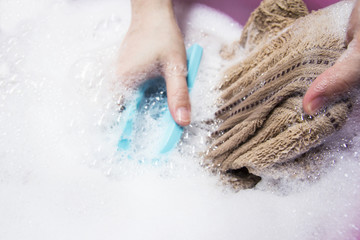 Fototapeta premium Woman washing towel