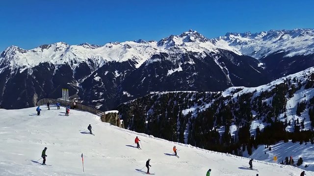Skier skiing resort timelapse top view