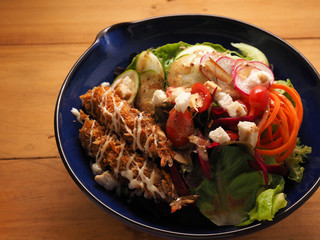 Fried shrimp with salad