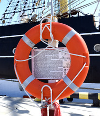 Lifebuoy on the pier in the port