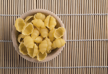 raw pasta called conchiglie