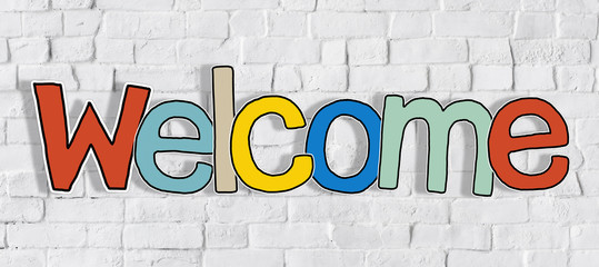 Welcome Word and Brick Wall in Background © Rawpixel.com
