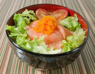 Bowl of White Rice Topping with Salmon and Vegetable