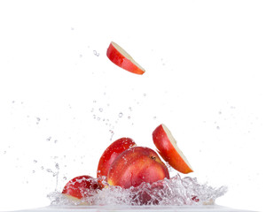 Fresh apple in water splash on white backround