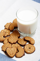 Cookies  and  glass of milk. Selective focus on cookies