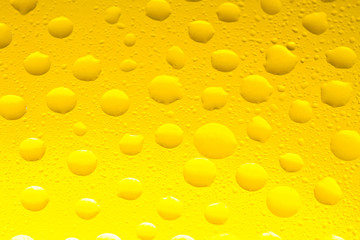 Drops on yellow background