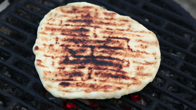 Chef arranging bun on barbecue grill Full HD 