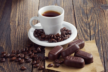 Coffee cup with chocolates