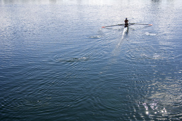 Women rowing in a lake