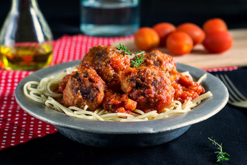 Beef meatballs with tomato sauce and pasta