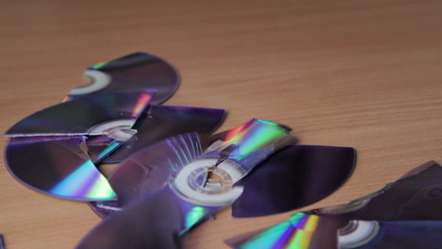 Pieces of broken CD, DVD