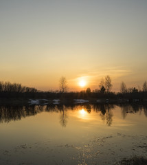 Sunset on the river in spring.