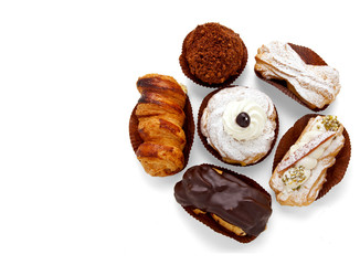 different types of Italian puff pastries: with cream, nuts, choc