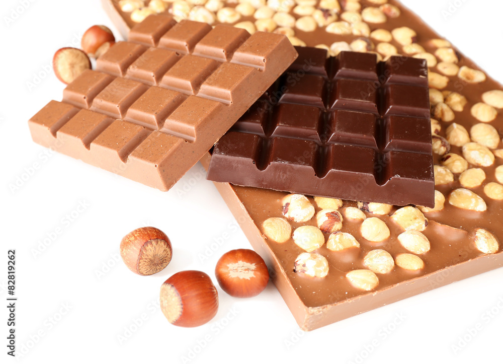 Wall mural Black and milk chocolate bars with hazelnuts isolated on white - Wall murals