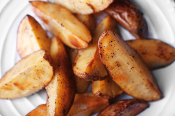 Baked potatoes on pate close up