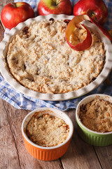 Traditional apple crisp close-up in baking dish. Vertical