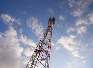 Telecom tower in the evening bright sunlight 