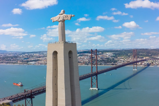 Aerial view Jesus Christ monument watching to Lisbon city in Por