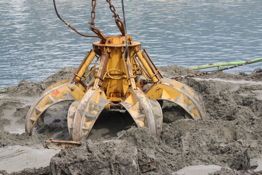 dredge and barge in the harbor