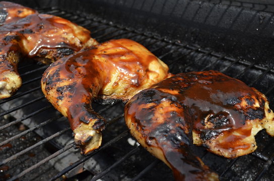 Chicken legs and thighs on the BBQ grill