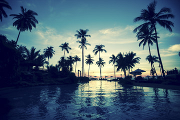 Naklejka na ściany i meble Twilight on amazing ocean tropical beach.
