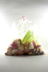 Fresh fruits salad in packing  on white