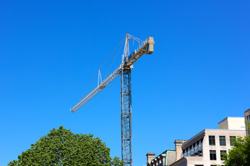 Obraz premium Construction crane in the city. 