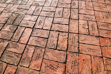 Red brick paving on a sidewalk at Ayutthaya, world heritage, Tha