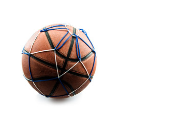 Fototapeta na wymiar Old basketball ball in a net isolated on white background.