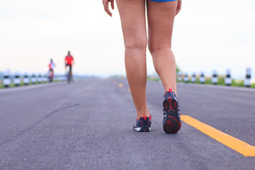 Stock Photo - athlete running sport feet on trail healthy lifest