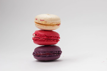 Multicolor macaroons on white background