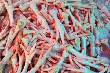 Fresh chicken foot in the market