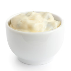 Small round dish of home made tartar sauce. Isolated.