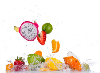 Mix fruit in water splashes on white background