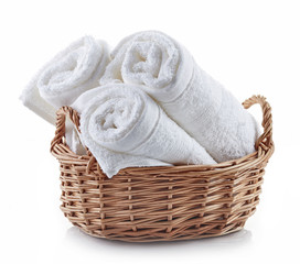 white spa towels in a basket