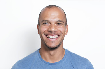 Portrait of a handsome mixed race man smiling to camera