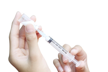Drawing Vaccine Into Syringe