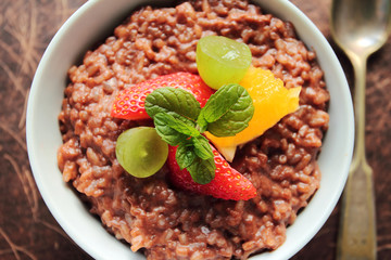 Closeup of pudding rice dessert with fruits