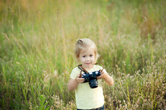 a girl with a camera