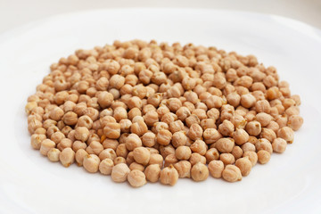 Plate with raw chickpeas