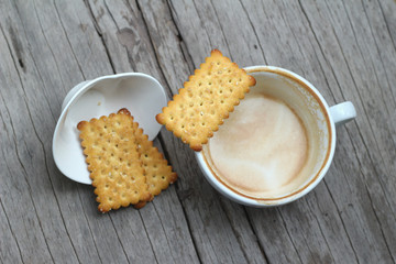 latte coffee in glass and crackers
