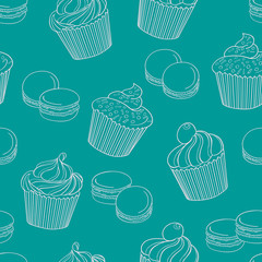 Delicious cupcakes with macaroons on green background, seamless
