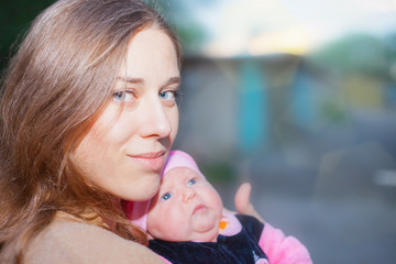 happy mother with baby at outdoor