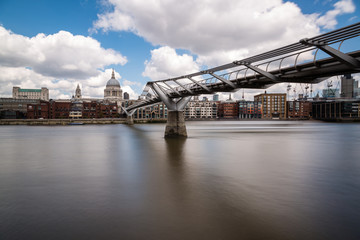 Fototapeta na wymiar St Paul's cathedral with the Millennium bridge and river Thames