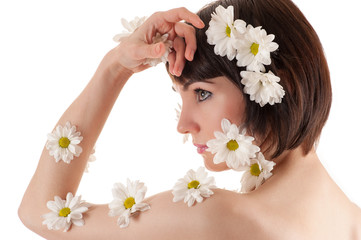 Obraz na płótnie Canvas beautiful face of woman with flowers chrysanthemums