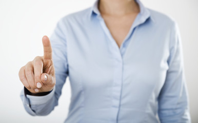 businesswoman pressing on the empty digital touch screen