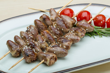 Grilled chicken hearts barbecue