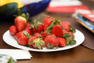 Fresh strawberries on working table