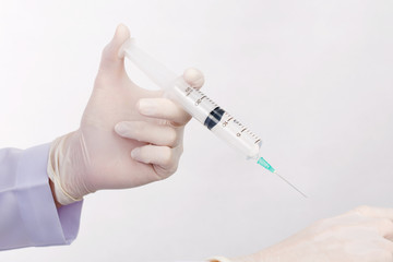 Doctor demonstrate inject saline solution patient isolated on wh